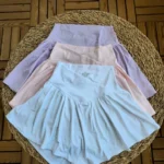 دامن تنیسی زنانه کشاله دار رنگ نوک مدادی و یاسی